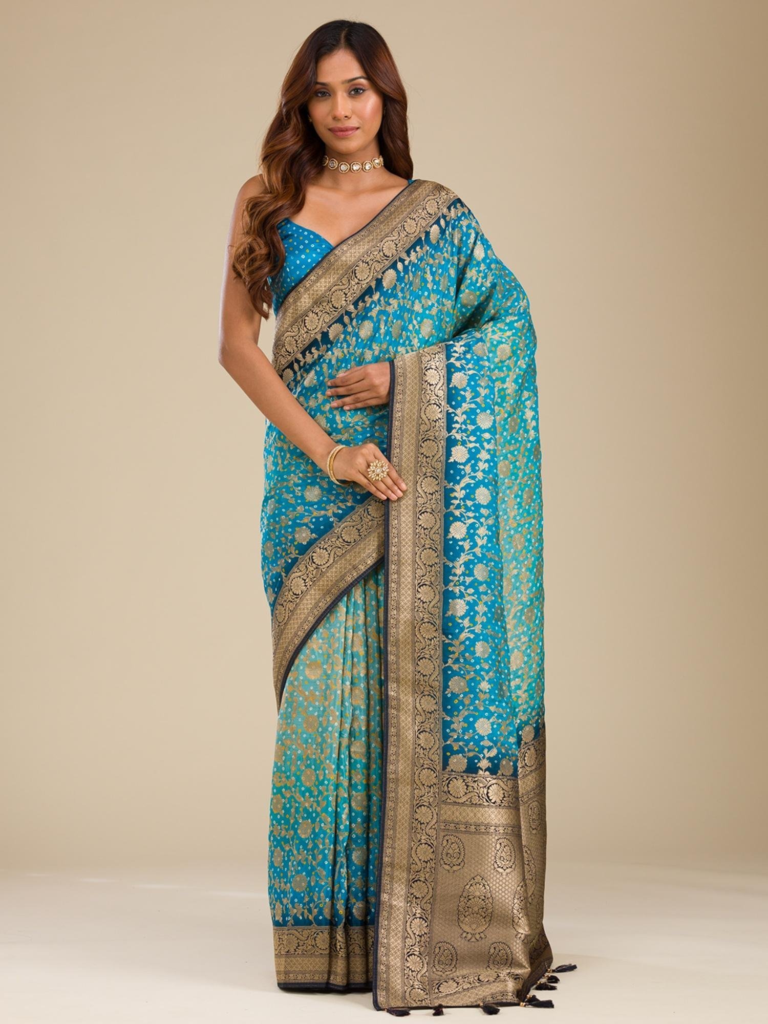 ad10b11SAUS0040410TURQUOISEBLUE_1.jpg Turquoise Blue Zari Georgette Saree with Unstitched Blouse - Image 1